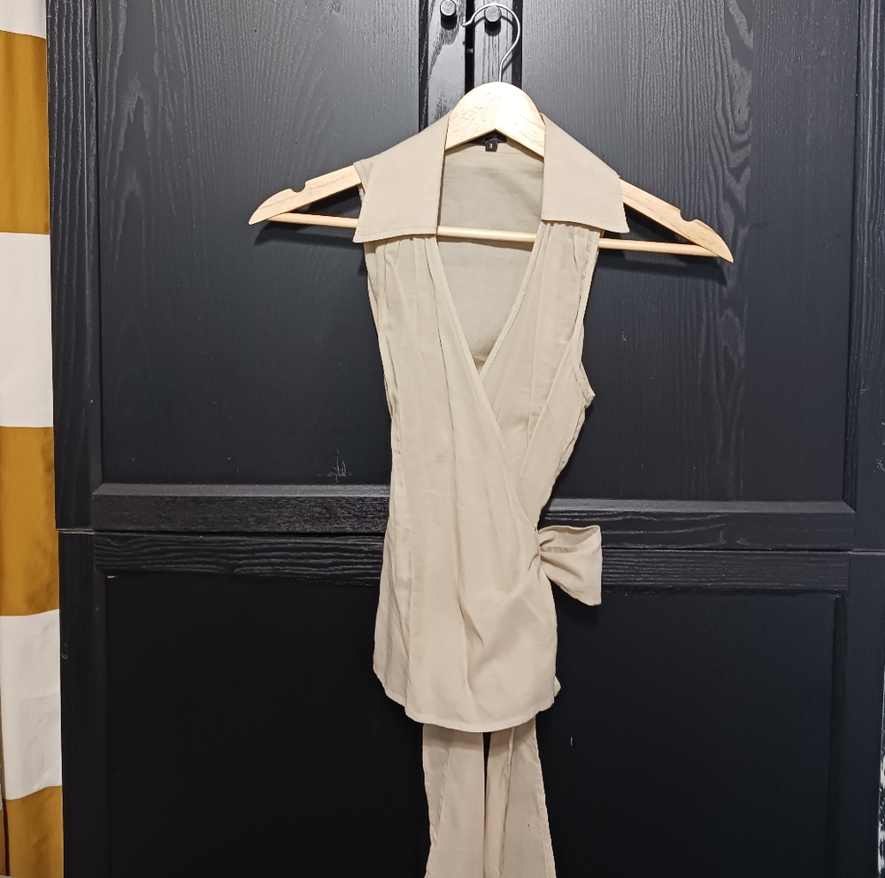 Elegant Cream Sleeveless Wrap Top